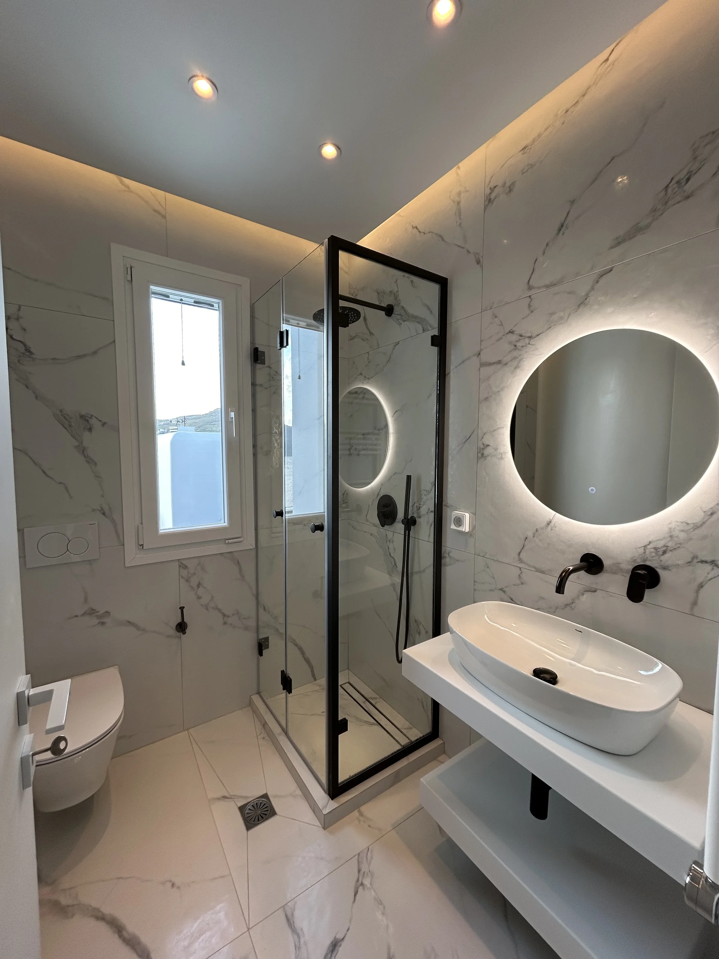 Modern bathroom with natural stone finishes